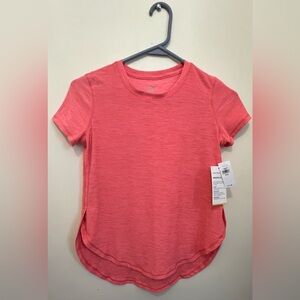 Old Navy t-shirt orange / salmon color. Size youth medium (8). New with tags.